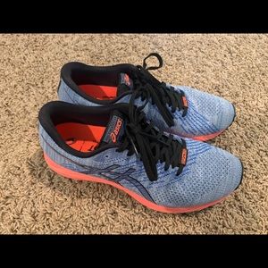 Women’s ASICS running shoes size 8.